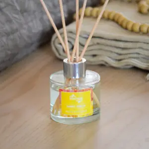 Sunny Side Up Reed Diffuser bottle and reeds