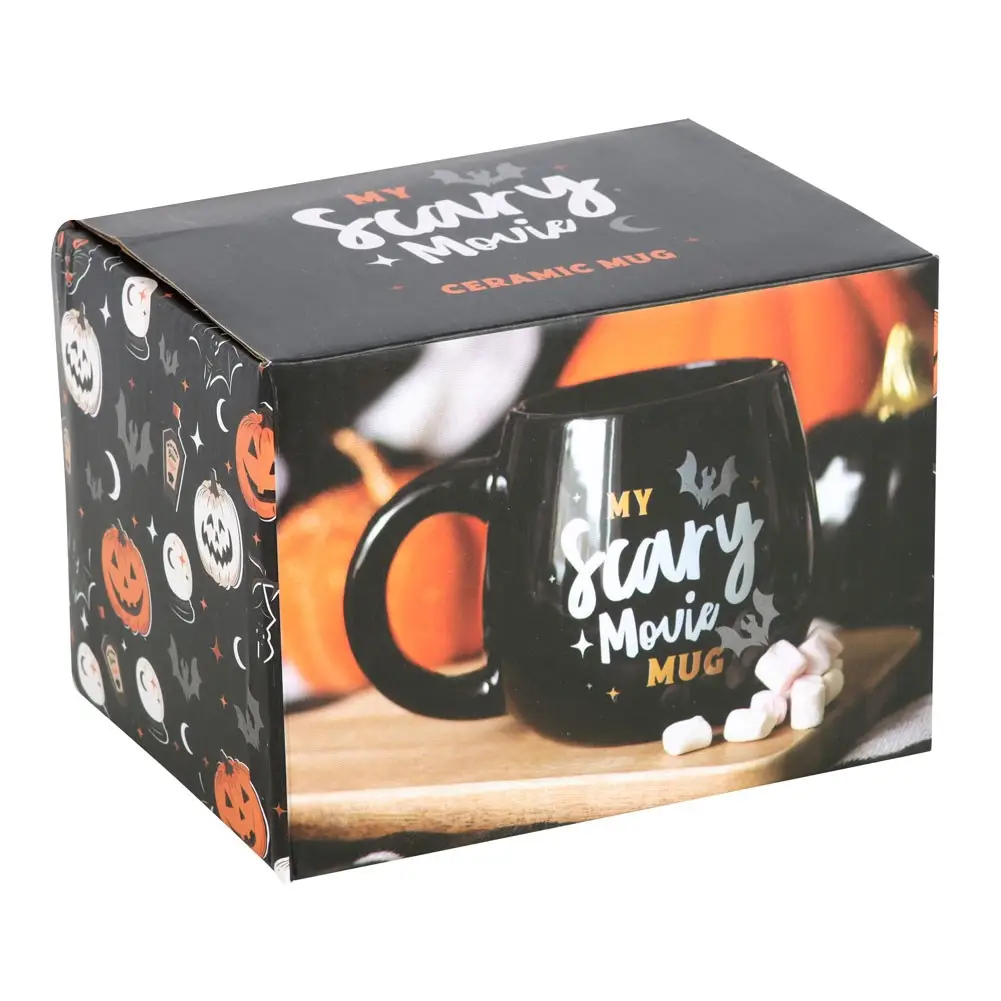 Box which contains a hallowen themed mug